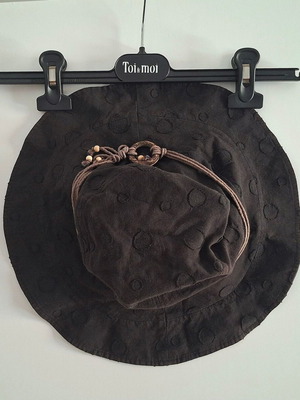 Black summer hat with brown decorative details, cotton