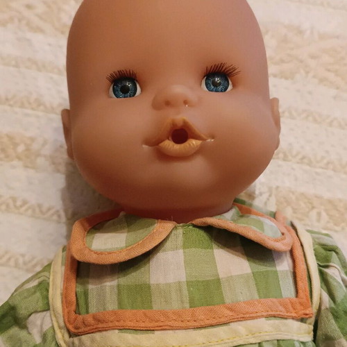 Large Famosa doll used with stain on dress