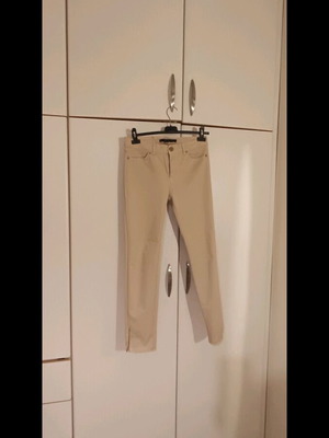 Zara beige pants with ankle zipper like new, size L