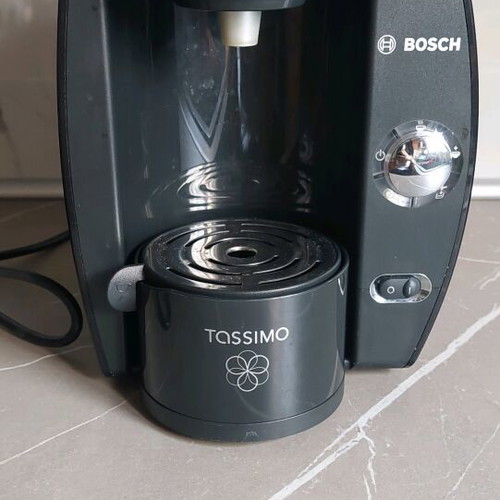 Bosch Tassimo coffee maker used with instructions and cleaning system
