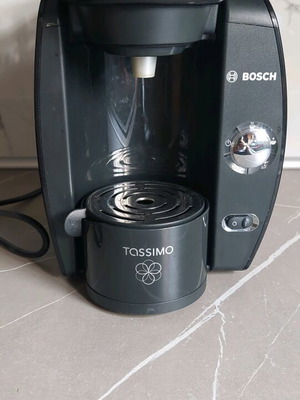 Bosch Tassimo coffee maker used with instructions and cleaning system