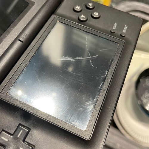 Nintendo DS Lite used, black with cartridge and original charger