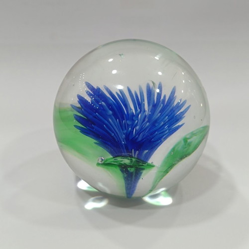 Vintage handmade art glass paperweight with blue flower