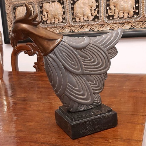 Decorative bird used with metal head and wooden base