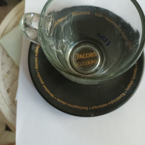 Jacobs glass coffee mug with porcelain saucer