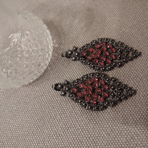 Dangling earrings with purple-eggplant crystals unused