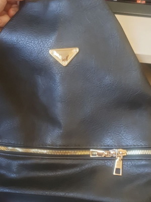 Black convertible sling bag backpack, synthetic leather, gold details