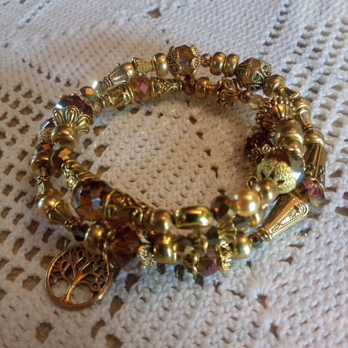 Handmade bracelet new in golden tones