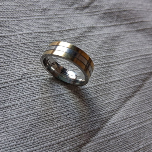 Steel ring silver and gold color like new
