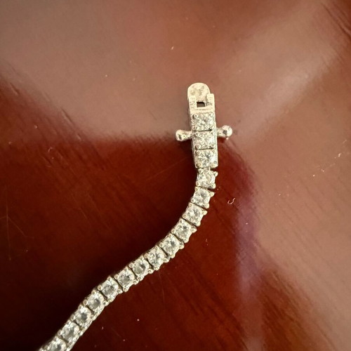 Riviera tennis bracelet used, size 18, silver-plated, gray