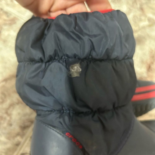 Crocs boots used with small tear