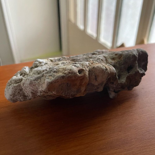 Natural rock with quartz and iron oxides