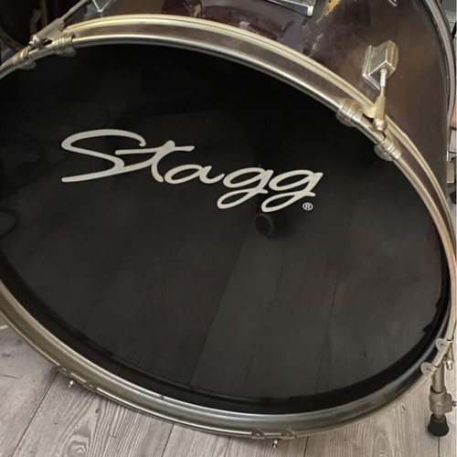 Stagg drum set used, complete with bass drum, toms, snare and cymbals