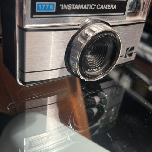 Kodak Instamatic 177X camera used, with Kodar lens and strap