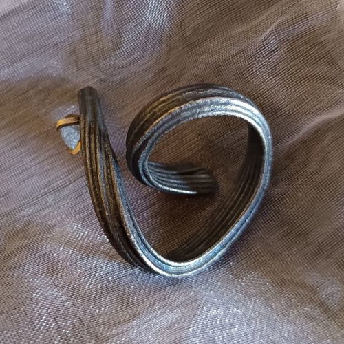 Handmade ring of oxidized silver with white topaz like new