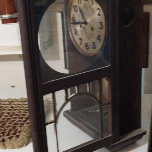 Wall clock pendulum used, wooden, old, with door and winding key