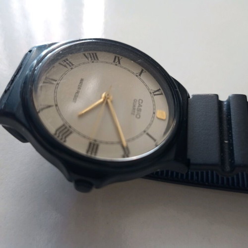 Orient quartz used, black, functional with light scratches