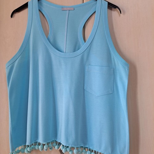 Sleeveless top new turquoise with pon pon