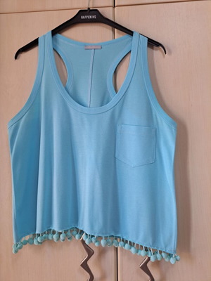 Sleeveless top new turquoise with pon pon