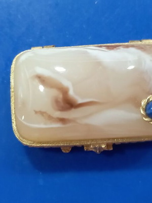 Vintage powder compact used with stone on lid