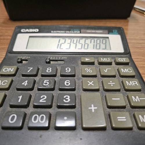 Casio d-20m used collectible calculator with solar power