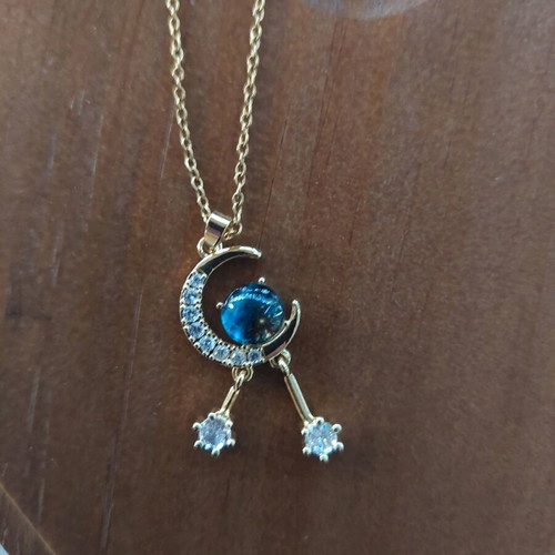 Steel necklace with moon and turquoise stone new, gold color
