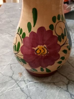 Decorative beige ceramic jug with flowers like new