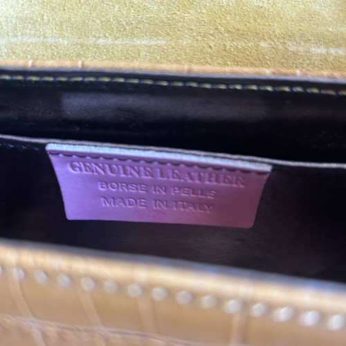 Yellow leather bag with bamboo strap