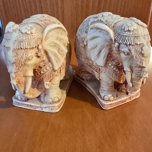 Pair of decorative elephants used with detailed embossed design