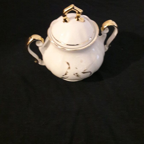Vintage porcelain teapot and sugar bowl set like new