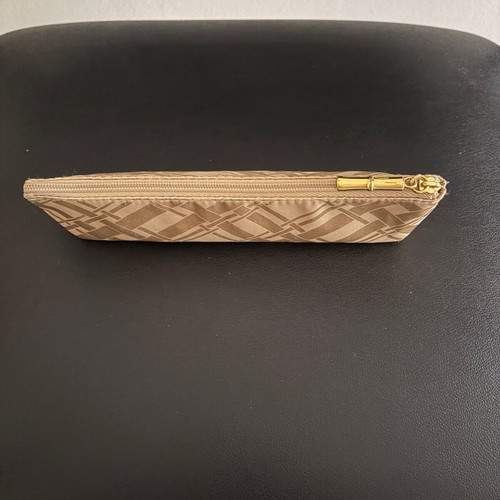 Estée Lauder toiletry bag new, gold color