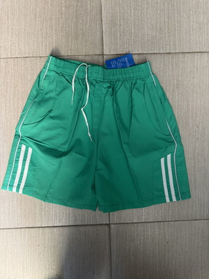 Athletic sprinter shorts new, turquoise with zipper pockets