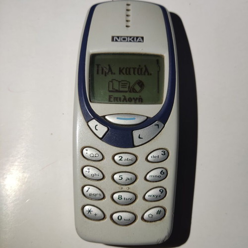 Nokia 3330 used with new battery and original charger