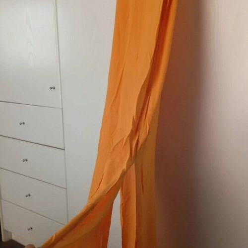 Semi-sheer long orange dress with side slits