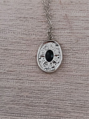 Steel pendant oval with black stone, like new