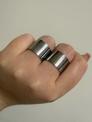 Set of 2 adjustable silver rings used, minimal design