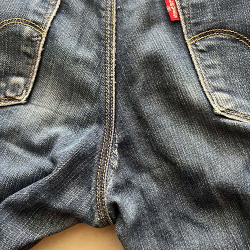 Levi's 572 Bootcut Jeans used, dark wash blue denim, size S 36