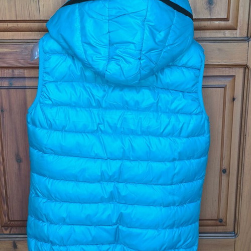 Turquoise vest used, size M