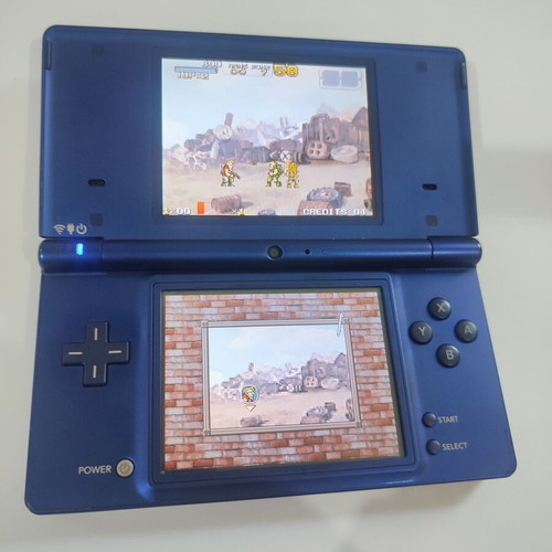 Nintendo DSi handheld console with Pokemon HeartGold game