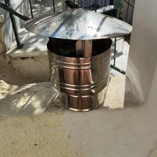 Metal chimney cap used
