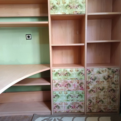 Desk with bookshelf and multiple storage spaces used