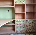 Desk with bookshelf and multiple storage spaces used
