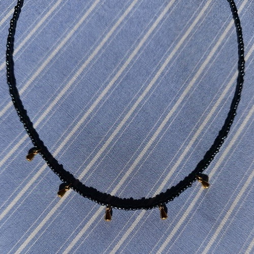Necklace with black glass beads and gold-plated drops made of steel wire new