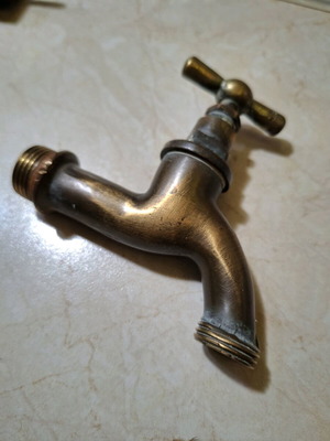 Bronze faucet used from the 1950s, functional