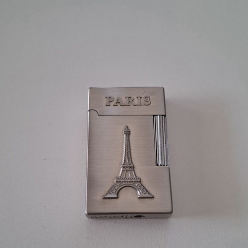 Gas lighter with Eiffel Tower design, like new