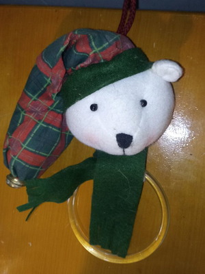 Christmas teddy bear like new, hanging baby toy with bell