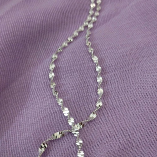 Twisted shiny silver chain new, approximately 60 cm long