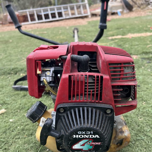 Honda GX31 Brush Cutter used, four-stroke with hole in tank