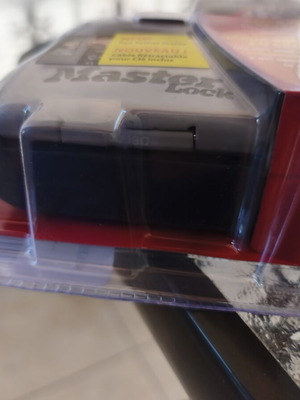 Master Lock padlock with key storage and combination