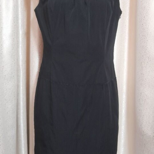 VS black sleeveless dress with round neckline and pleats, size 50